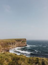 Scenic view of sea against clear sky