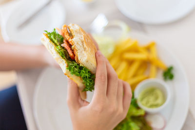 Close-up of hand holding food