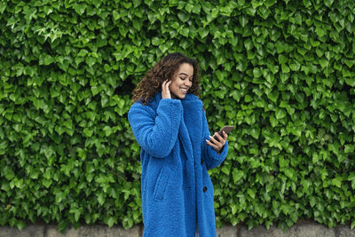 Happy woman looking at camera