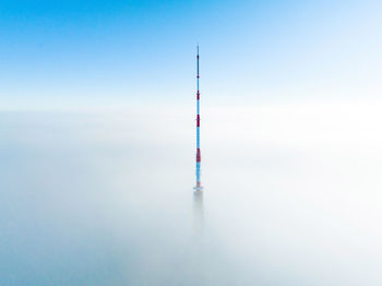 Aerial drone top view of the riga tv tower in latvia.