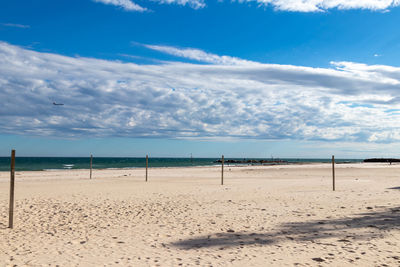 Scenic view of beach against sky