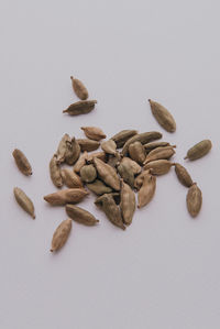 High angle view of bread on table against white background