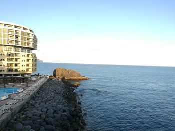 View of sea against blue sky