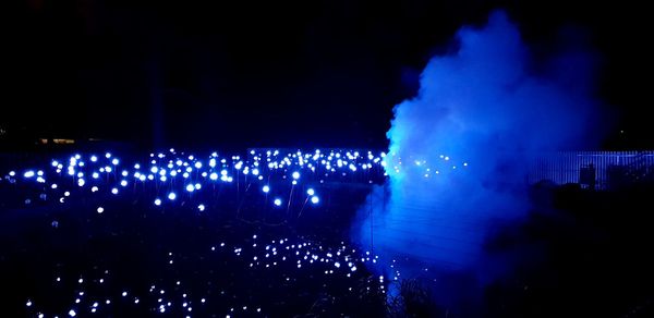 Panoramic shot of illuminated lights at night