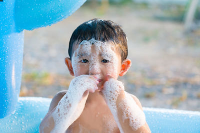 Portrait of boy in water