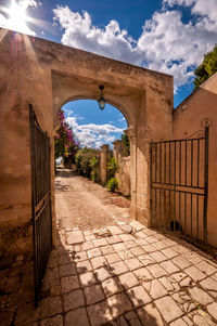 Walkway against sky