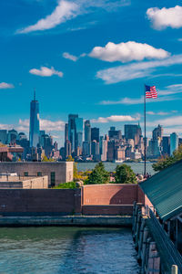 Buildings in city against sky