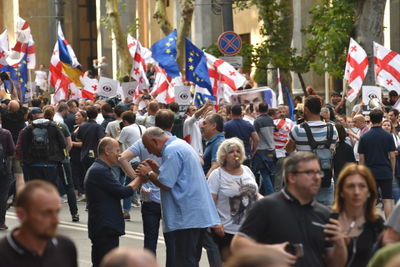 People on street in city