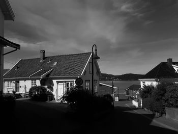 Houses and buildings against sky