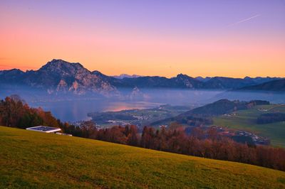 Scenic view of landscape against sky during sunset