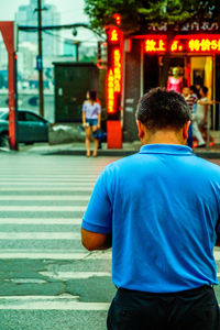 Woman standing in city