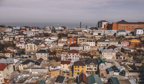 Aerial view of townscape against sky