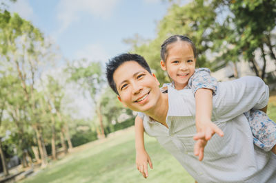 Father and daughter in park