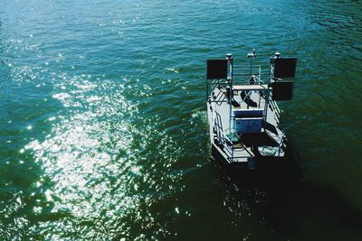 High angle view of ship sailing in sea