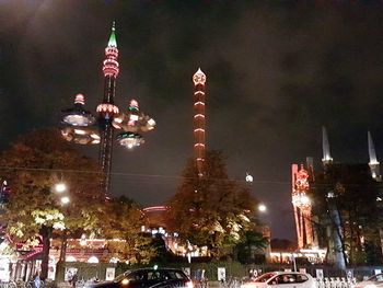 Illuminated buildings in city at night