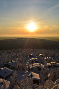 Scenic view of beach against sky during sunset