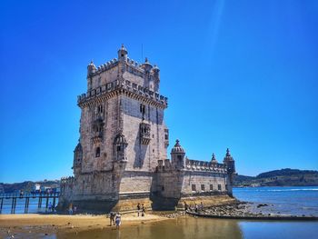 View of historical building against blue sky