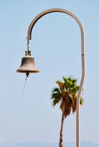 Low angle view of street light against sky