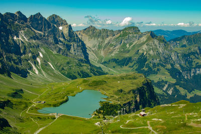 Scenic view of landscape and mountains against sky