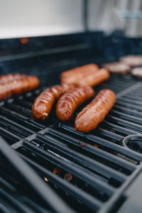 Close-up of meat on barbecue grill