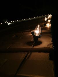 View of illuminated street light at night