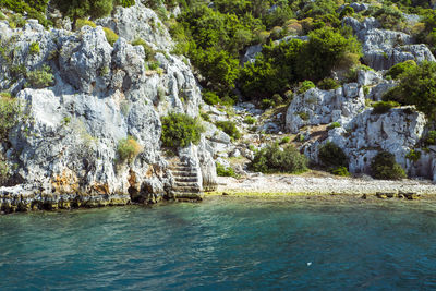 Scenic view of rocks by sea