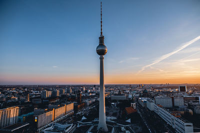 High angle view of buildings against sky during sunset