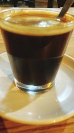 Close-up of coffee cup on table