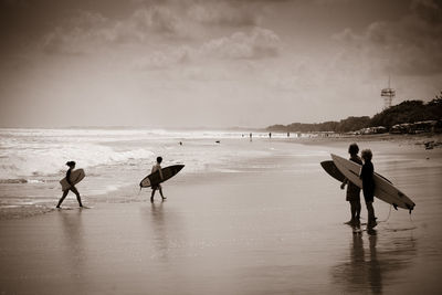 People enjoying at beach