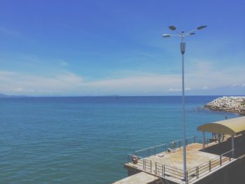 Scenic view of seascape against blue sky