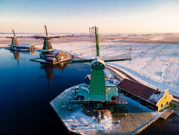 High angle view of ship moored on sea during winter