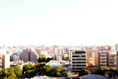 Cityscape against clear sky