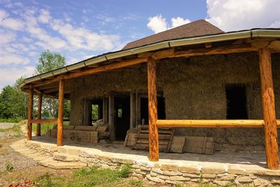 Exterior of abandoned building against sky