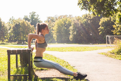 Side view of woman in park