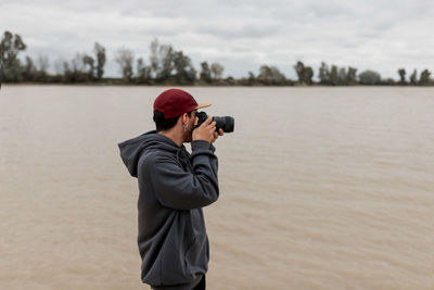 Man photographing on camera