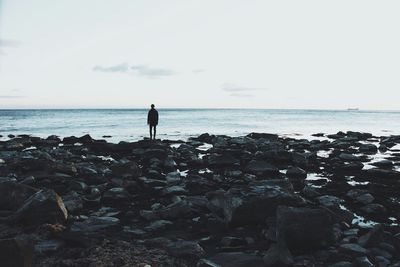 People standing on beach