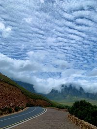 Empty road against sky