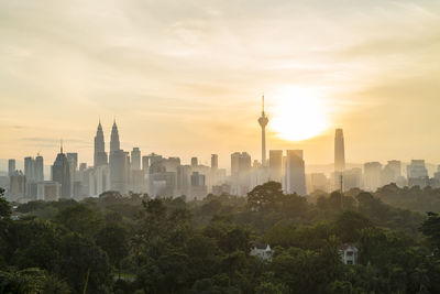 View of buildings against sky during sunset