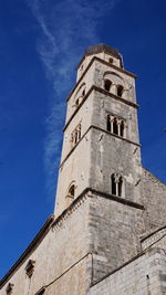 Low angle view of historic building against sky