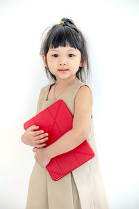 Portrait of a smiling girl over white background