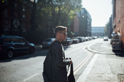 Man on street in city