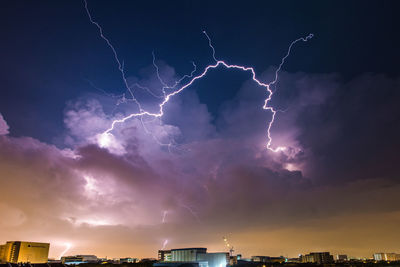 Lightning bolt dancing freely and widely across the late night skies - singapore