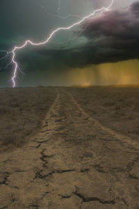 Idyllic shot of lightning in sky during sunset