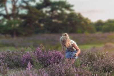 Girl standing on field