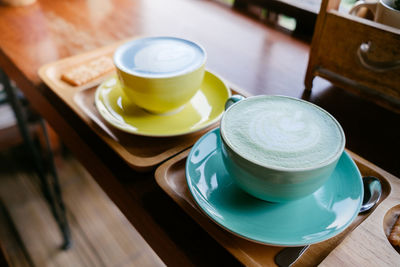 High angle view of coffee cup on table