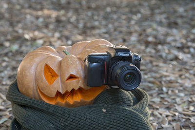 Close-up of camera photographing