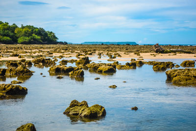 Scenic view of rocks against sky