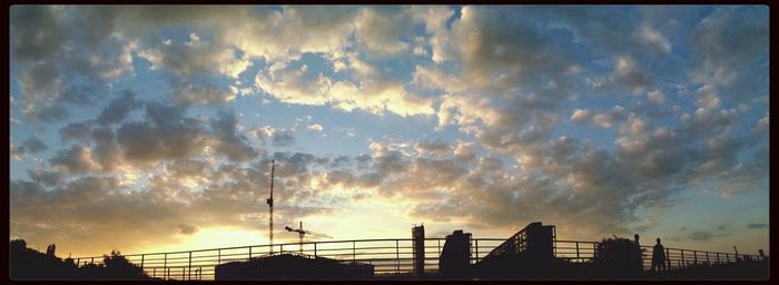 Low angle view of cloudy sky at sunset