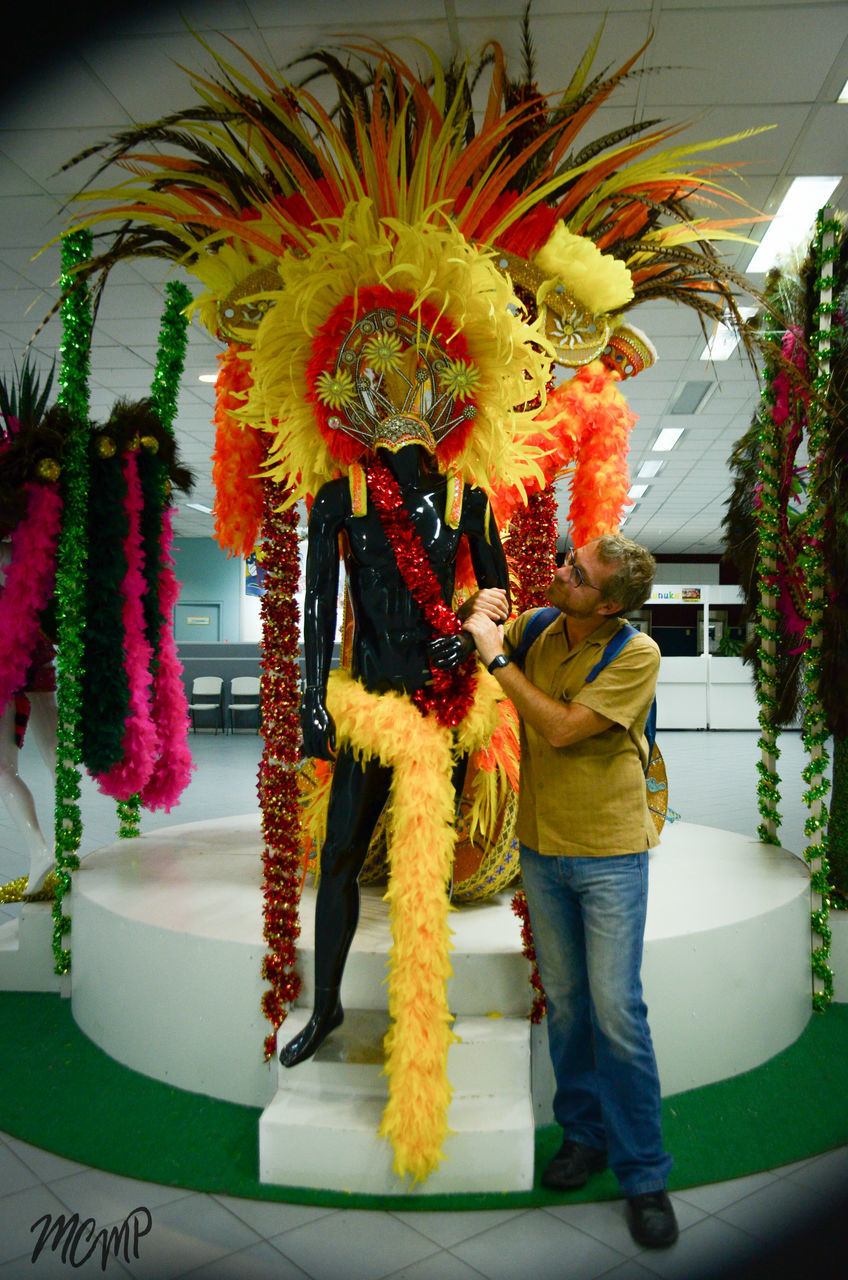 MIDSECTION OF WOMAN WITH FLOWERS IN TEMPLE