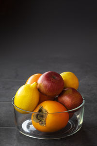 Close-up of fruits in bowl on table
